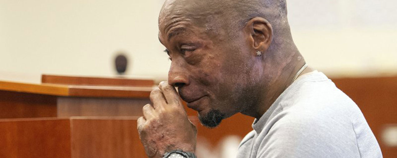 In this Aug. 10, 2018 file photo, Dewayne Johnson reacts after hearing the verdict in his case against Monsanto at the Superior Court of California in San Francisco. A Northern California groundskeeper says he will accept a judge's reduced verdict of $78 million against Monsanto after a jury found the company's weed killer caused his cancer. DeWayne Johnson's attorney informed the San Francisco Superior Court on Wednesday, Oct. 31, 2018. (Josh Edelson/Pool Photo via AP, File)