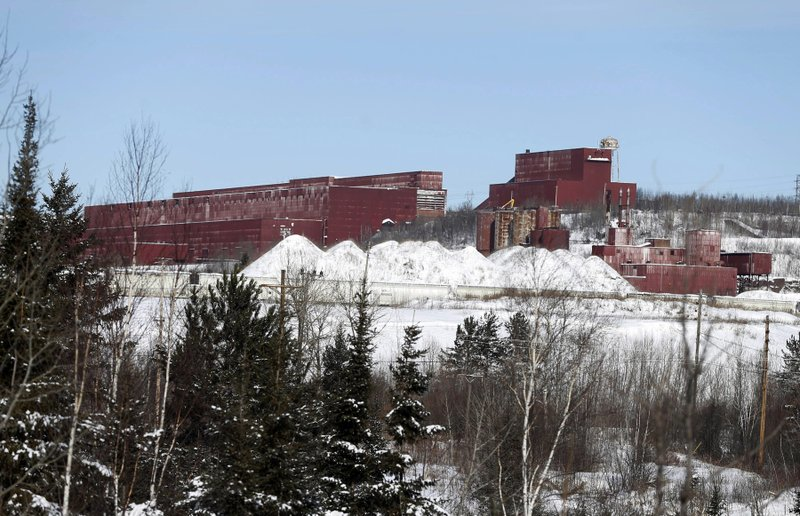In this Feb. 10, 2016, file photo, the closed LTV Steel taconite plant is abandoned near Hoyt Lakes, Minn. The Minnesota Department of Natural Resources said Thursday, Nov. 1, 2018, it has issued permits to Poly Met Mining Inc. for a planned copper-nickel mine at the site. (AP Photo/Jim Mone)