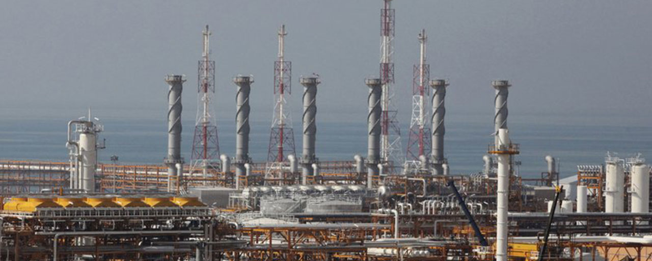 In this Jan. 22, 2014, file photo, a partially constructed gas refinery at the South Pars gas field is seen on the northern coast of Persian Gulf in Asalouyeh, Iran. Japan, South Korea and other major oil importers welcomed Tuesday the decision by the Trump administration to let them continue to import Iranian crude oil and other petroleum products despite the re-imposition of sanctions on Tehran. (AP Photo/Vahid Salemi)