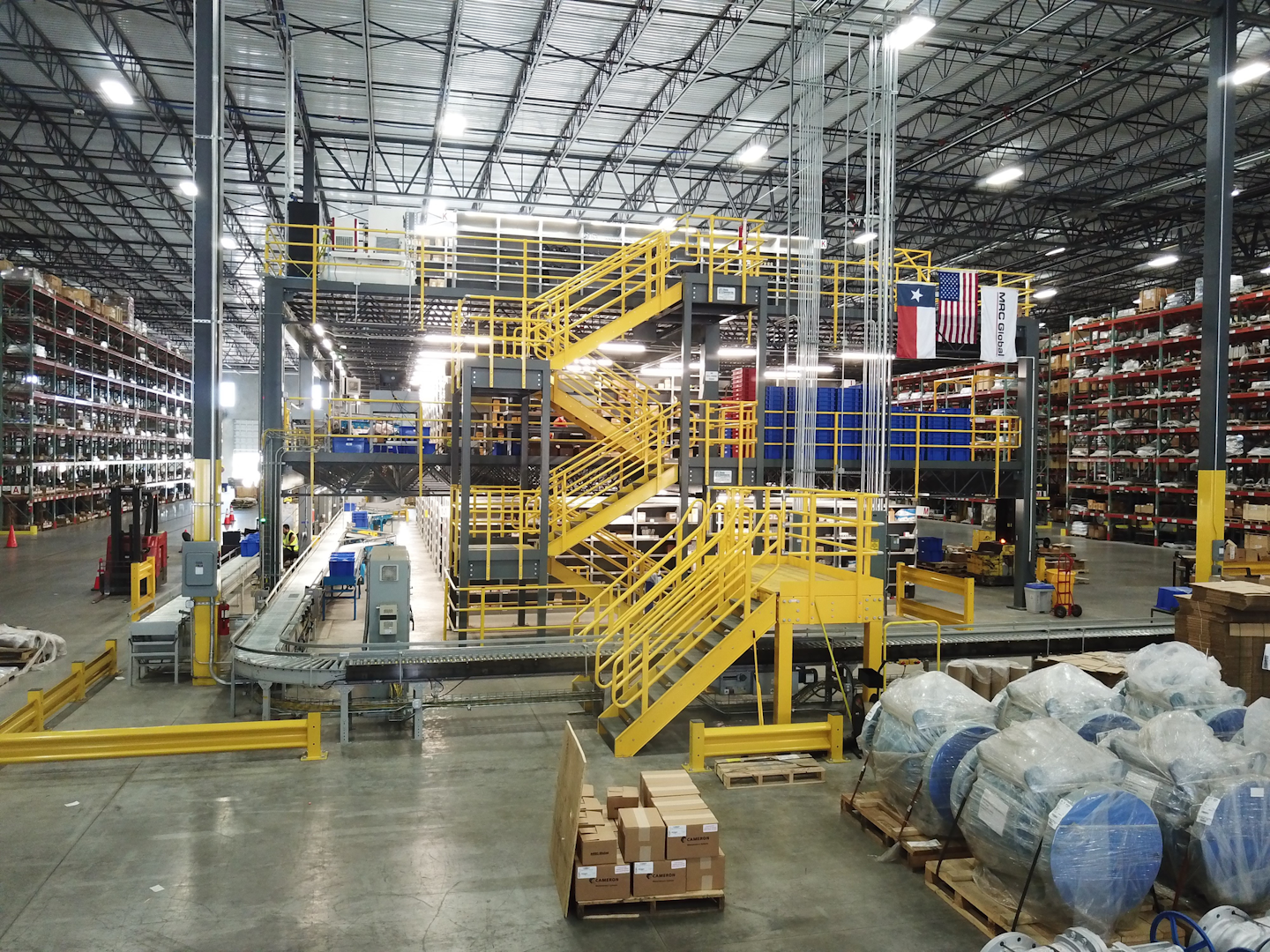 This three-story mezzanine holds 9,000 products on our three-story mezzanine and automatically sorts them to be shipped to a branch, directly to UPS or to be added to products located in the rest of our facility before being shipped out. Hand-held scanners identify the products needed and stops the tote automatically when more products are needed. Each tote also carries bar coding as well as RFID technology so we always know where materials are and the progress of every order that is being pulled.