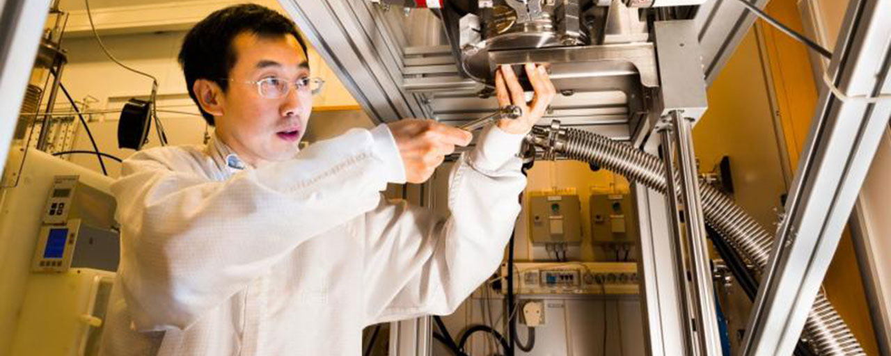 Jianwu Sun at Linköping University inspecting the growth reactor for growth of cubic silicon carbide. Credit: Thor Balkhed/LiU