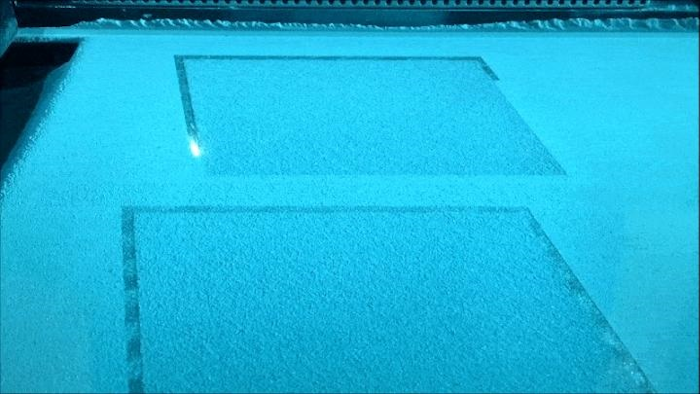 A laser interacts with Inconel powder inside the EOS DMLS M290 at the Swanson School's ANSYS Additive Manufacturing Research Lab. Image credit: Swanson School of Engineering/ANSYS AMRL