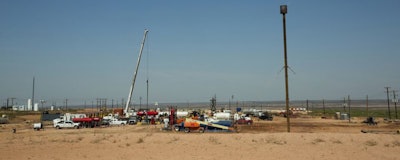 This photo taken May 24, 2018 shows a flare burning on the southwest corner of the Smith Ranch. Kenneth Smith, Inc. continues to be responsible for the grazing fees associated with the lands under the facility of which no longer grow vegetation; a necessity of the grazing lease. This is the case in all development of the lands for non-agriculture related utilization approved by the Bureau of Land Management and NM State Land Office. The actual footprint of acres lost, yet still on grazing lease responsibility is 7.3 times the what the BLM is reporting; a total of 125.41 acres. (Robin Zielinski /The Las Cruces Sun News via AP)