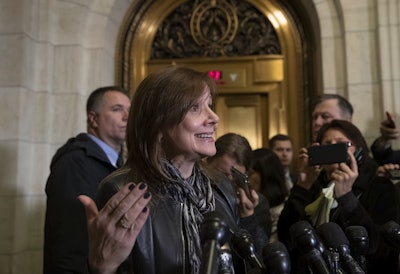 General Motors CEO Mary Barra speaks to reporters after a meeting with Sen. Sherrod Brown, D-Ohio, and Sen. Rob Portman, R-Ohio, to discuss GM's announcement it would stop making the Chevy Cruze at its Lordstown, Ohio, plant, part of a massive restructuring for the Detroit-based automaker, on Capitol Hill in Washington, Wednesday, Dec. 5, 2018. Image credit: AP Photo/J. Scott Applewhite