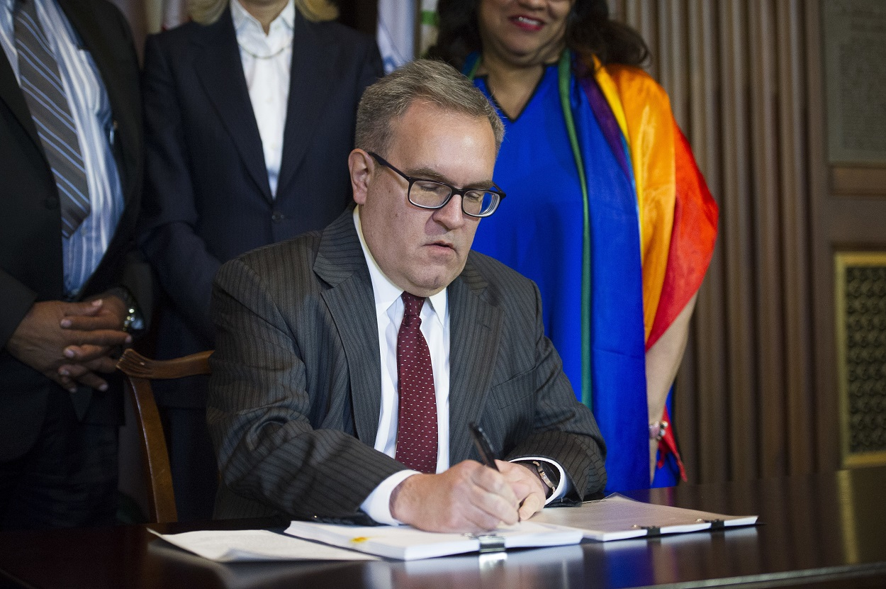 Acting EPA Administrator Andrew Wheeler signs an order withdrawing an Obama era emissions standards policy, at the EPA Headquarters in Washington, Thursday, Dec. 6, 2018. Image credit: AP Photo/Cliff Owen