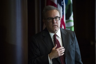 Acting EPA Administrator Andrew Wheeler announces that new coal plants no longer have to meet planned, tougher, Obama era emissions standards, during a news conference at the EPA Headquarters in Washington, Thursday, Dec. 6, 2018. (AP Photo/Cliff Owen)