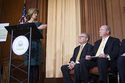 Sen. Lisa Murkowski, R-Alaska, gestures towards Acting EPA Administrator Andrew Wheeler, center and Assistant Secretary of the Army for Civil Works Rickey 'RD' James, after Wheeler signed an order withdrawing federal protections for countless waterways and wetland, at EPA headquarters in Washington, Tuesday, Dec. 11, 2018. Image credit: AP Photo/Cliff Owen