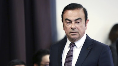 In this May 12, 2016, photo, then Nissan Motor Co. President and CEO Carlos Ghosn attends a joint press conference with Mitsubishi Motors Corp. in Yokohama, near Tokyo. Image credit: AP Photo/Eugene Hoshiko