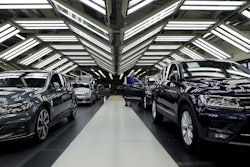In this Thursday, March 8, 2018 file photo Volkswagen cars are pictured during a final quality control at the Volkswagen plant in Wolfsburg, Germany. Image credit: AP Photo/Michael Sohn, file