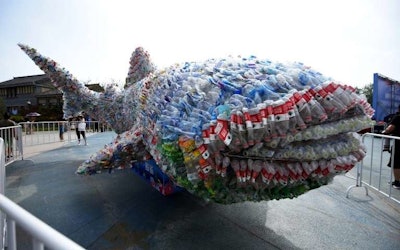 Social media stories of plastic pollution have increased awareness, and prompted action such as an installation depicting a shark made of plastic bottles in China. (Scientific Reports)