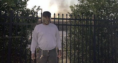 Charlie Powell stands outside one of the industrial sites at the 35th Avenue Superfund site in Birmingham, Ala., Wednesday, Jan. 9, 2019. Image credit: AP Photo/Kimberly Chandler