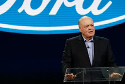 In this Jan. 14, 2018, file photo Ford President and CEO Jim Hackett prepares to address the media at the North American International Auto Show in Detroit. Image credit: AP Photo/Carlos Osorio, File