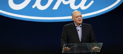 In this Jan. 14, 2018, file photo Ford President and CEO Jim Hackett prepares to address the media at the North American International Auto Show in Detroit. Image credit: AP Photo/Carlos Osorio, File