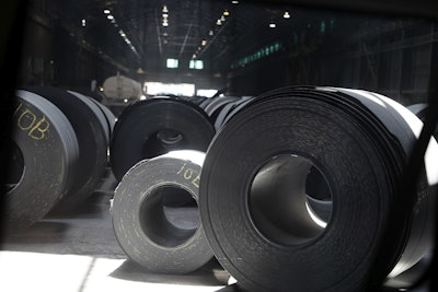 This June, 28, 2018, photo shows rolls of finished steel at a facility in Granite City, Ill. Image credit: AP Photo/Jeff Roberson, File
