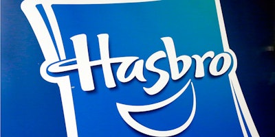 FILE - This April 26, 2018, file photo, shows the Hasbro logo at the TTPM 2018 Spring Showcase, in New York. Hasbro returned to a profit in its fourth quarter, but the toy company's performance still fell short of Wall Street's expectations as it continues to deal with the demise of Toys R Us. Shares tumbled more than 8 percent in Friday, Feb. 8, 2019 premarket trading. (AP Photo/Richard Drew, File)