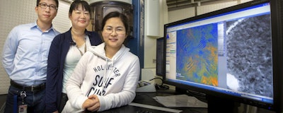 FSU Assistant Professor of Physics Hanwei Gao, National MagLab researcher Yan Xin and FSU graduate student Xi Wang worked with a transmission electron microscope to conduct research on halide perovskites. (FSU Photography Services)