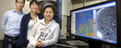 FSU Assistant Professor of Physics Hanwei Gao, National MagLab researcher Yan Xin and FSU graduate student Xi Wang worked with a transmission electron microscope to conduct research on halide perovskites. (FSU Photography Services)
