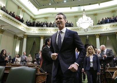 California Gov. Gavin Newsom delivers his first state of the state address to a joint session of the legislature at the Capitol Tuesday, Feb. 12, 2019, in Sacramento, Calif. Image credit: AP Photo/Rich Pedroncelli