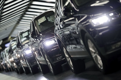 In this March 8, 2018 file photo photo Volkswagen cars are pictured during a final quality control at the Volkswagen plant in Wolfsburg, Germany. Image credit: AP Photo/Michael Sohn, file