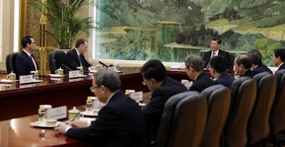 U.S. Trade Representative Robert Lighthizer, second from left, speaks with Chinese President Xi Jinping, next to U.S. Treasury Secretary Steven Mnuchin, left, during a meeting at the Great Hall of the People in Beijing, Friday, Feb. 15, 2019. Image credit: AP Photo/Andy Wong, Pool