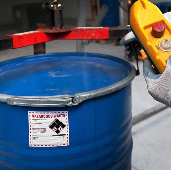 The label corrosive on a chemical container indicates