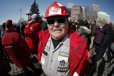 Frank Deshane of Brighton, Colo., takes part in a rally outside the state Capitol in Denver on Tuesday, March 5, 2019, in opposition of lawmakers' plan to advance a bill to overhaul the state's oil and gas regulations. (AP Photo/David Zalubowski)
