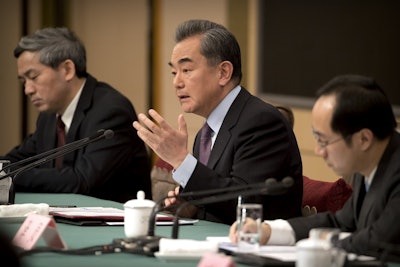 Chinese Foreign Minister Wang Yi listens to a journalist's question during a press conference on the sidelines of the annual meeting of China's National People's Congress (NPC) in Beijing, Friday, March 8, 2019. Image credit: AP Photo/Mark Schiefelbein