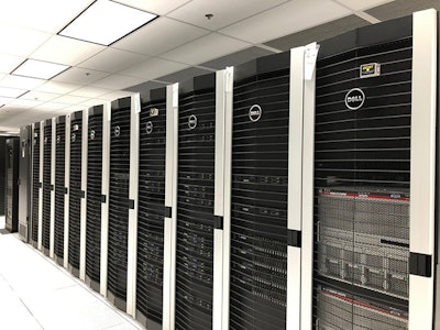 In this Dec. 20, 2018 photo computers at Chemical Abstracts Service store data that bound journals used to catalog chemical breakthroughs by scientists in Columbus, Ohio. Today computers in its 16,800-square-foot data center store three petabytes of information for CAS customers. (AP Photo/Julie Carr Smyth)