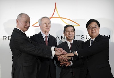 From left, Renault CEO Thierry Bollore, Renault Chairman Jean-Dominique Senard, Nissan CEO Hiroto Saikawa and Mitsubishi Motors Chairman and CEO Osamu Masuko pose for photographers after their joint press conference at the Nissan headquarters in Yokohama, near Tokyo, Tuesday, March 12, 2019. Image credit: AP Photo/Eugene Hoshiko