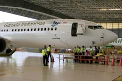 In this image from video taken on Tuesday, March 12, 2019, a Boeing 737 Max 8 aircraft is in hangar before the inspection at Garuda Maintenance Facility at Soekarno Hatta airport, Jakarta. Image credit: AP Photo