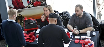 In this March 7, 2019, file photo visitors to the Pittsburgh veterans job fair meet with recruiters at Heinz Field in Pittsburgh. Image credit: AP Photo/Keith Srakocic, File