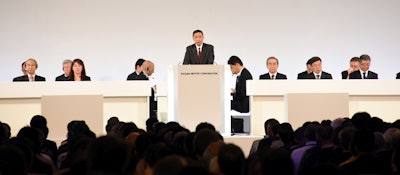 In this photo released by Nissan Motor Co., Nissan Chief Executive Hiroto Saikawa, center, speaks at the company's shareholders' meeting in Tokyo Monday, April 8, 2019. Image credit: Nissan Motor Co. via AP