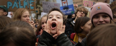 In this Friday, March 29, 2019 file photo, students attend a protest rally of the 'Friday For Future Movement in Berlin, Germany. A group that has helped organize weekly student protests in Germany against climate change is calling for the country’s phase-out of coal-fired power plants to be sped up. (AP Photo/Markus Schreiber)
