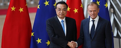 China's Premier Li Keqiang, left, shakes hands with European Council President Donald Tusk during an EU-China summit at the European Council headquarters in Brussels, Tuesday, April 9, 2019. (AP Photo/Francisco Seco)