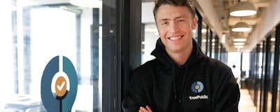 In this Thursday, April 4, 2019, photo Kaben Clauson, poses for a photo t at his TruePublic office in Chicago. Small business owners like Clauson are wary as they see signs of a weaker economy have been scaling back hiring in recent months and finding ways to get work done without new employees. Clauson had planned on taking on full-time staffers, but partly because of the economy decided against the added risk. (AP Photo/Charles Rex Arbogast)