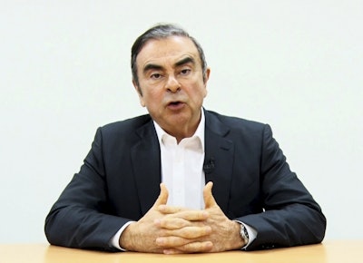 In this image made from video released by Carlos Ghosn via his lawyer on Tuesday, April 9, 2019, former Nissan chairman Ghosn speaks on camera in Tokyo. Image credit: Carlos Ghosn via AP