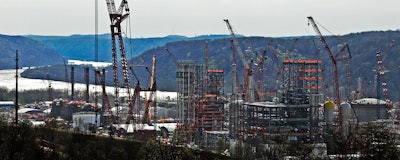 This April 18, 2019 file photo shows part of a petrochemical plant being built on the banks of the Ohio River in Monaca, Pa., for the Royal Dutch Shell company. The plant, which is capable of producing 1.6 million tons of raw plastic annually, is expected to begin operations by 2021. (AP Photo/Gene J. Puskar)