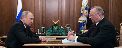 Russian President Vladimir Putin, left, listens to Nikolai Tokarev, President of Russian Oil company Transneft during their meeting in Moscow, Russia, Tuesday, April 30, 2019. (Alexei Druzhinin, Sputnik, Kremlin Pool Photo via AP)