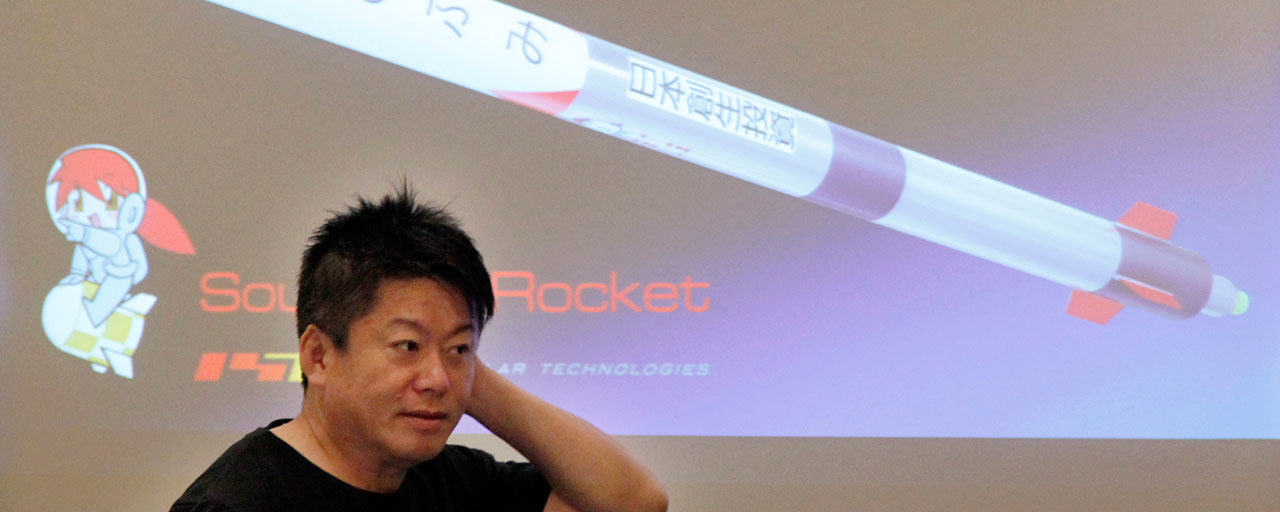 Japanese entrepreneurs and Founder of Interstellar Technologies Inc. Takafumi Horie speaks during a press conference in Tokyo, Wednesday, May 15, 2019. Horie said a low-cost rocket business in Japan is well-positioned to accommodate scientific and commercial needs in Asia. While Japan's government-led space programs have demonstrated top-level technology, he said the country has fallen behind commercially due to high costs. (AP Photo/Koji Sasahara)