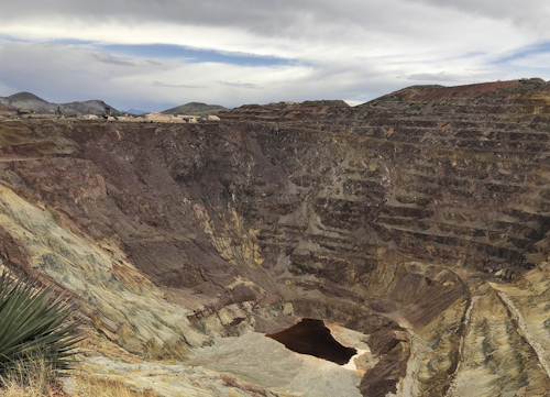 This photo taken Monday, May 12, 2019, shows what's left of the Lavender pit mine outside the southeastern Arizona city of Bisbee, where the copper operation stopped in 1974. Image credit: AP Photo/Anita Snow