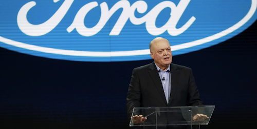 In this Jan. 14, 2018, file photo Ford President and CEO Jim Hackett prepares to address the media at the North American International Auto Show in Detroit. Image credit: AP Photo/Carlos Osorio, File