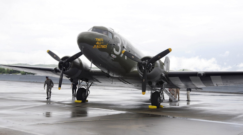 In this April 9, 2019, photo, the World War II troop carrier That's All, Brother sits on an airport tarmac during a stop in Birmingham, Ala. Image credit: AP Photo/Jay Reeves