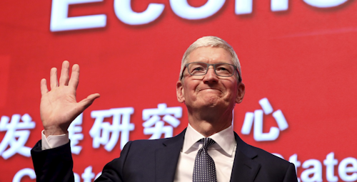 In this Saturday, March 23, 2019, file photo, Apple CEO Tim Cook waves as he arrives for the Economic Summit held for the China Development Forum in Beijing, China. Image credit: AP Photo/Ng Han Guan, File