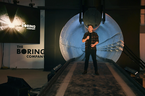In this Dec. 18, 2018 file photo Elon Musk, co-founder and chief executive officer of Tesla Inc., speaks during an unveiling event for the Boring Co. Hawthorne test tunnel in Hawthorne, Calif. Image credit: Robyn Beck/Pool Photo via AP, File
