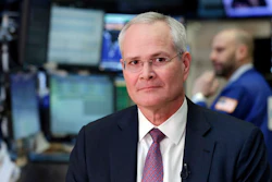In this Wednesday, March 1, 2017, photo, Exxon Mobil Chairman & CEO Darren Woods sits for an interview on the floor of the New York Stock Exchange. Image credit: AP Photo/Richard Drew, File