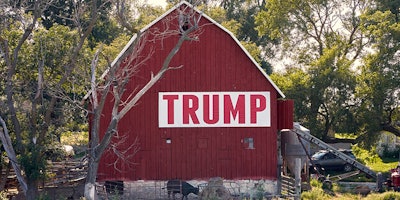 FILE - In this July 24, 2018 file photo, corn grows in front of a barn carrying a large Trump sign in rural Ashland, Neb. The Trump administration is following through on a plan to allow year-round sales of gasoline mixed with 15% ethanol. The Environmental Protection Agency announced the change Friday, May 31, 2019, ending a summertime ban imposed out of concerns for increased smog from the higher ethanol blend. The change also fulfills a pledge that President Donald Trump made to U.S. corn farmers to allow the higher ethanol sales year-round. (AP Photo/Nati Harnik File)