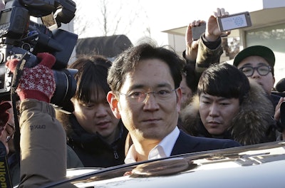 In this Feb. 5, 2018, file photo, Lee Jae-yong, vice chairman of Samsung Electronics, gets into a car to leaves a detention center in Uiwang, South Korea. Image credit: AP Photo/Ahn Young-joon, File