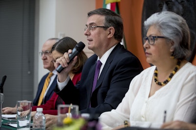 Mexican Foreign Affairs Secretary Marcelo Ebrard, center, speaks at a news conference at the Mexican Embassy in Washington, Monday, June 3, 2019, as a Mexican delegation arrives in Washington for talks following trade tariff threats from the Trump Administration. Image credit: AP Photo/Andrew Harnik