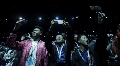 Attendees await the start of the keynote address at the Apple Worldwide Developers Conference in San Jose, Calif., Monday, June 3, 2019. Image credit: AP Photo/Jeff Chiu