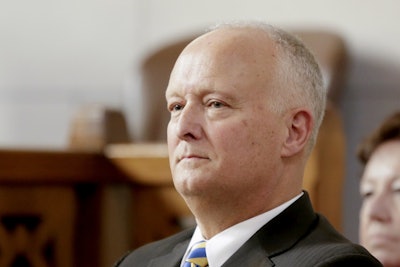 In this Jan. 10, 2019, file photo, Nebraska Attorney General Doug Peterson waits to be sworn in at the State Capitol in Lincoln, Neb. Image credit: AP Photo/Nati Harnik, File